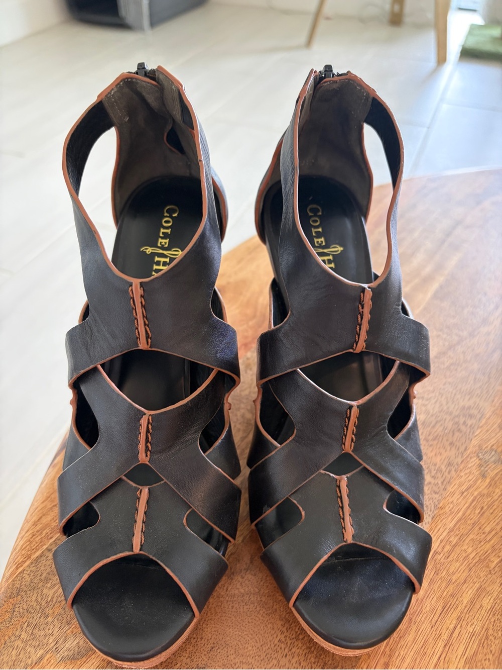 Cole Haan Black with Brown Trim Cutout Leather Heels. With Nike Air